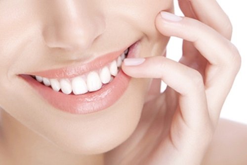 Nguyên nhân và cách khắc phục bọc răng sứ bị thâm lợi 2