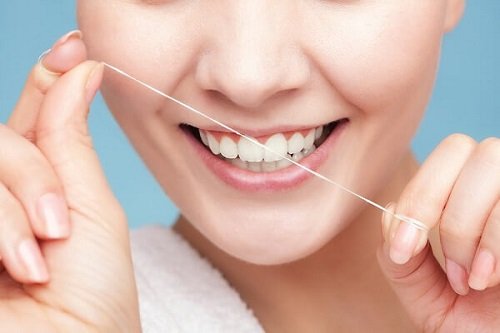 Trồng răng sứ có bị hôi miệng không? Cách chăm sóc răng đúng cách 3